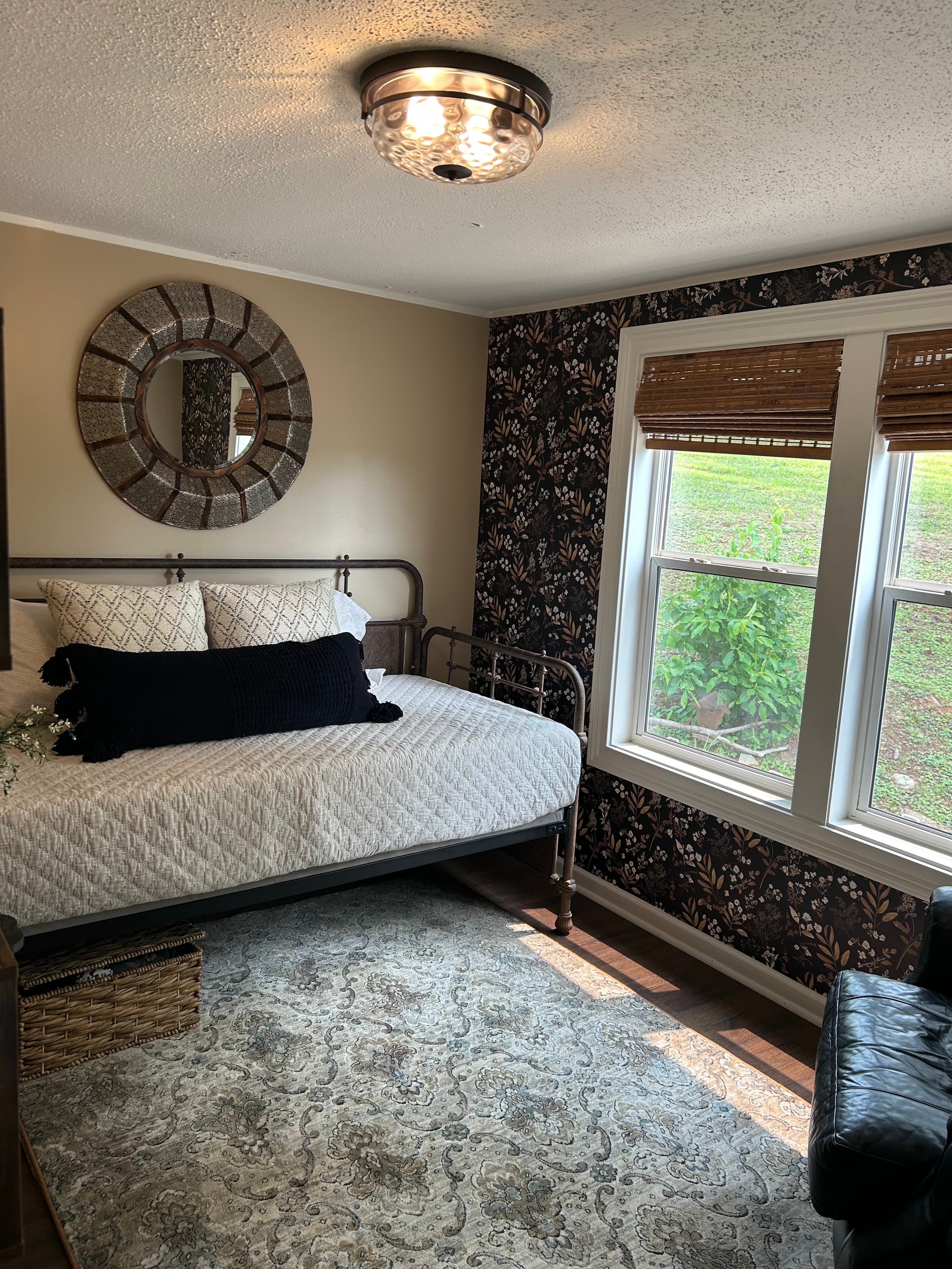 Bedroom 3 with black and tan decor and daybed